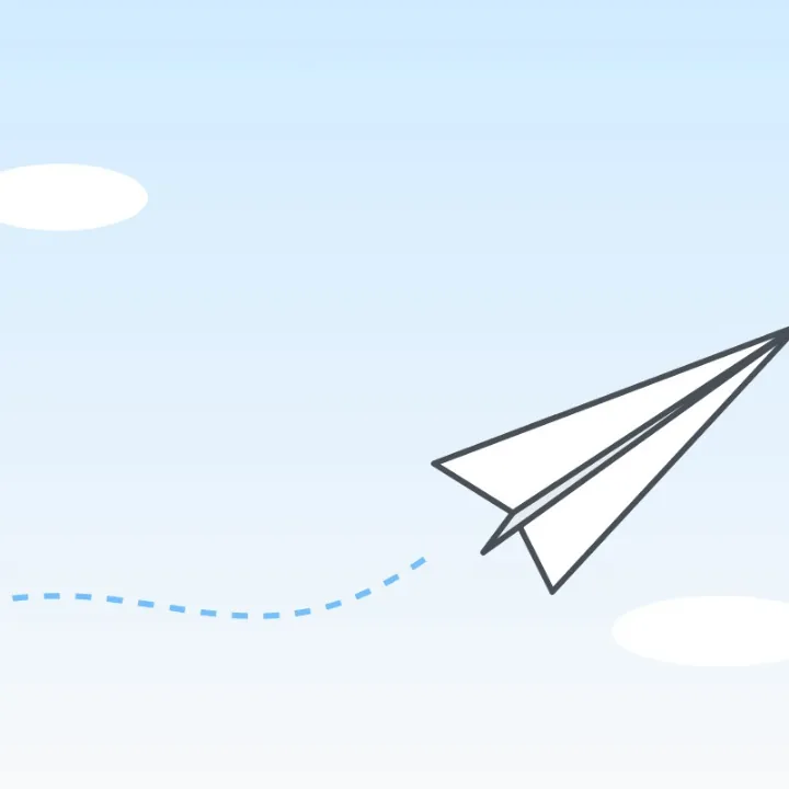 A paper plane flying through a pale sky, a frame of a GIF, as a JPG