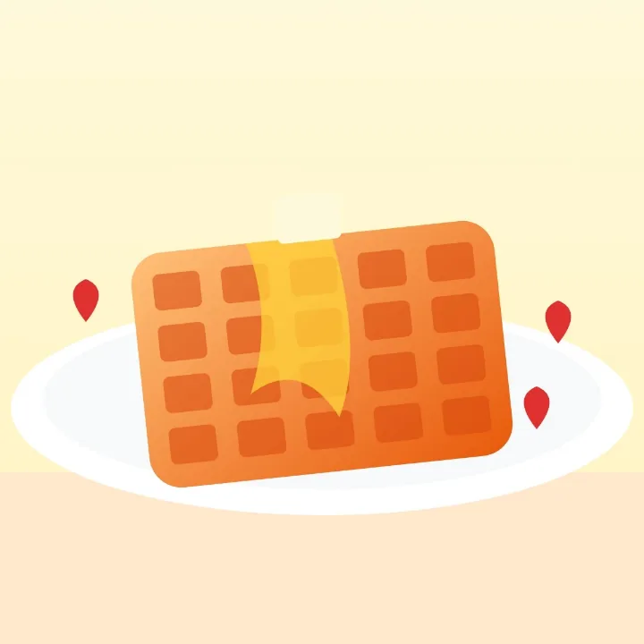 A waffle with butter and syrup on a plate, a picture saved as WebP for a landing page