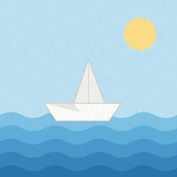 A paper boat on blue waves under a pale sun