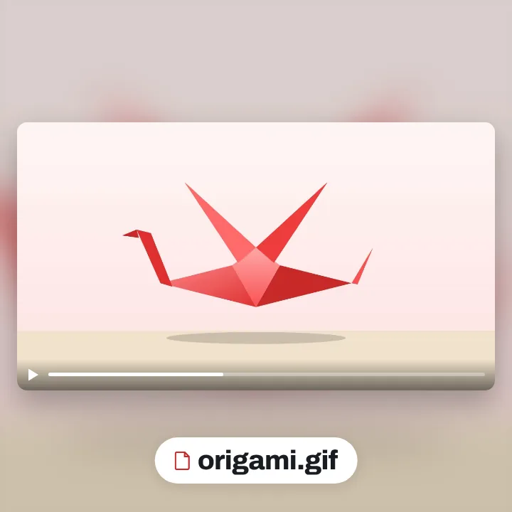 A red origami crane flapping its wings, saved as a GIF